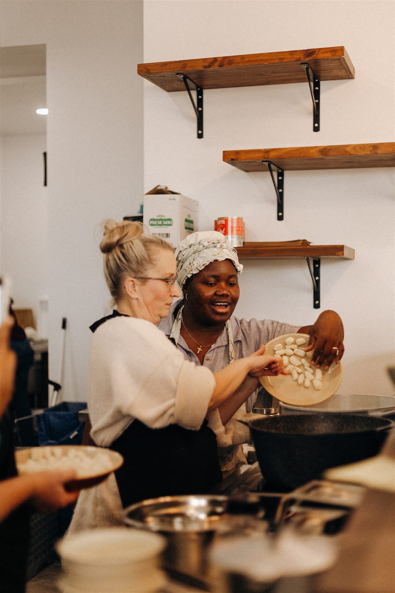The da Cecot team making fresh pasta in their warm Italian kitchen, Edmonton